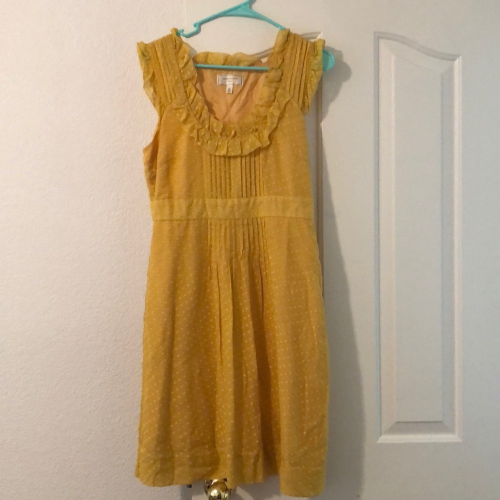 Gold polka dot dress.